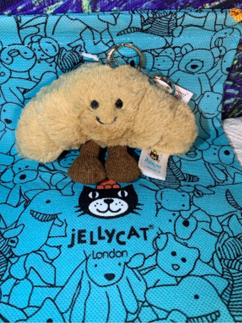 Jellycat Croissant Plush Keychain includes the bag- Tan with Brown Legs